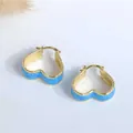 Detailed close-up showing the S925 hallmark on blue marbled enamel heart hoop earrings - Light Blue