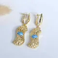 Pendientes de gota en forma de cacahuete chapados en oro 18K con diseño de ojo turco - Azul claro