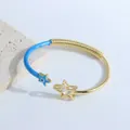 Bracelet jonc étoile avec œil maléfique en émail bleu et plaqué or 18 carats et zircon - Bleu clair