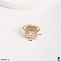 Detail of gold rectangular ring with shell inlay and cubic zirconia stones, size 1.4x1.6cm - Rectangular Mother of Pearl Style (E)