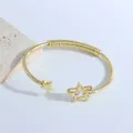 Bracelet ajustable plaqué or 18 carats avec breloques étoiles et zircon incrusté - Or