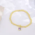 Gold beaded bracelet featuring a square purple zircon birthstone charm for women - June (Light Amethyst Zirconia)