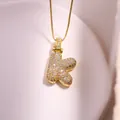 Collier avec pendentif lettre K bombée dorée orné de zircons cubiques brillants - Lettre K