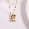 Gold plated bubble letter E necklace with sparkling zircons on a satellite chain - Letter E