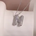 Silver letter H pendant necklace with micro-paved cubic zirconia on a dainty bead chain - Letter H