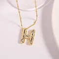 Gold plated letter H necklace with sparkling cubic zirconia on a beaded chain - Letter H