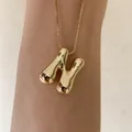 Collier initiale N gonflé plaqué or 18 carats avec finition miroir brillante - Style Lettre N