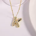 Golden necklace with cubic zirconia letter K bubble pendant on a beaded chain - Letter K