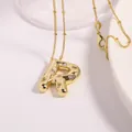 Golden bubble letter R necklace featuring cubic zirconia stones on a beaded chain - Letter R