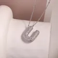 Silver-plated zircon encrusted letter U pendant necklace with a delicate bead chain - Letter U