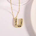 Golden letter U pendant necklace with sparkling cubic zirconia on a saturn chain - Letter U