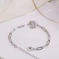 Bracelet chaîne trombone argenté orné d'un pendentif lettre I serti de zircons - Lettre I