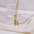 Glossy 18K gold plated balloon style letter K necklace with crystal paved bail on chain - Letter K