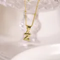 Golden 3D balloon letter Z pendant necklace with polished finish on decorative chain - Letter Z