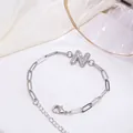 Bracelet chaîne trombone argentée avec pendentif lettre N serti de zircons - Lettre N
