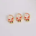 Macro shot of three colorful Santa Claus enamel charms for DIY bracelet jewelry making - Waving Santa Claus (04)