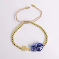 18K gold plated beaded bracelet with cross pendant and blue heart charm on a woven cord - Dark Blue