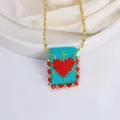 18K gold-plated necklace with a blue woven pendant featuring a red heart and cross - Green