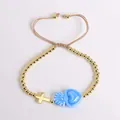 Braided bracelet with 18K gold beads, metal cross, and blue heart-shaped pendant - Sky Blue