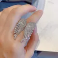 Silver angel wing open rings set with sparkling pavé zircons for a stylish women look - Silver