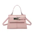 Bolso de mano rosa con cierre plateado y correa extraíble con un estilo elegante y sobrio - Rosa