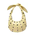 Pale yellow studded shoulder bag with oversized bow detail and silver eyelets - Yellow