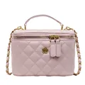 Pink quilted crossbody bag with golden flower detail and elegant chain strap for women - Pink
