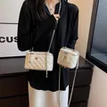 Classic white quilted crossbody chain bag with floral metal charms and dual zippers - Large / White