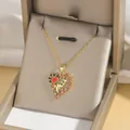 Detail of a gold heart pendant with Mom lettering and colorful zircons in a gift box - Mother's Day Letter Style (Mum)(X4015) / Red Letter