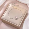 Bracelet ajustable en argent avec fleur en zircon rose et trèfle sur fond de satin - TS0262 Bracelet Rose