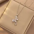 Silver butterfly necklace with star pendant and teardrop zircons on a jewelry box - Silver Clear Zirconia Butterfly Star (X4308)