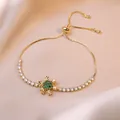 Verstelbare gouden bolo armband met groene zirkonia sneeuwvlok en tennis ketting - Smaragdgroene Sneeuwvlok Armband (TS0203)