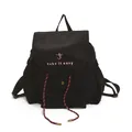 Minimalist black canvas backpack with Take It Easy embroidery and drawstring closure - Blue