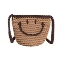Handwoven khaki bucket bag with brown smiley face pattern and adjustable shoulder strap - Khaki