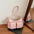 Pink glossy patent leather shoulder bag with vintage multi-pocket design and silver zippers - Pink