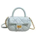 Light blue quilted leather crossbody bag with gold chain strap and turn-lock closure - Blue