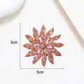 Détail de la broche flocon tournante avec cristaux roses et dimensions de 3cm - Xx0039
