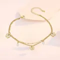Detail of double-layer gold anklet featuring butterfly charms and pearl accents with lobster clasp - Double Layer MOP Butterfly Style (TL0010)
