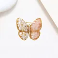 Macro detail of elegant butterfly brooch with pink crystals and white pearls - Pearl Pink Crystal Gold Butterfly Style (XX0067)