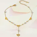 Detail of gold ankle chain featuring hollow heart charms and round zircon crystals - Heart Crystal Fine Chain Style (TL0017)