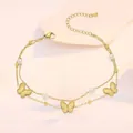 Detail of gold butterfly anklet featuring double-layer chains and white pearl accents - Butterfly Artificial Pearl Double Layer Style (TL0018)