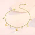 Detail of gold butterfly anklet with sparkling zircon charms and adjustable clasp - Butterfly Zirconia Bezel Style (TL0020)
