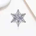 Elegant rotating silver snowflake brooch with sparkling crystals and zirconia stones - Xx0189