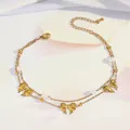 Detail of double-layer gold anklet featuring bow charms, pearls and adjustable chain extender - Three Bowknots Double Layer Style (TL0029)