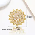 Detailed view of the 2.7cm gold flower brooch with sparkling zircon and dimensions info - Xx0202