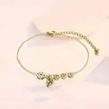 Detail of a gold-plated anklet featuring hollow circular charms and small bells - Hollow Round Pendant Bell Style (TL0031)