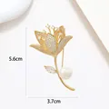 Detailed view of a 5.6cm gold flower brooch with white pearl and sparkling crystals - Gold Plated Pave Rhinestone Pearl Flower Style (XX0148)