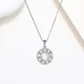 Close-up of sunflower pendant necklace with freshwater pearl and sparkling cubic zirconia - Silver Tone Sun Pearl Style (X4369)