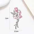Detailed view of butterfly pearl brooch with pink gems, measuring 5cm by 2.5cm size - Pink Teardrop Gem Twin Butterfly Bouquet Style (XX0155)