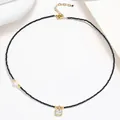 Black beaded necklace with single pearl and golden square zircon pendant variant - Black Bead Pearl Square Zirconia Style (X3687)